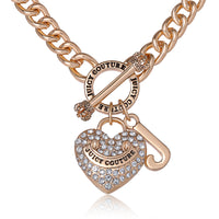 Goldtone Heart and Juicy Toggle Charm Necklace - Juicy Couture