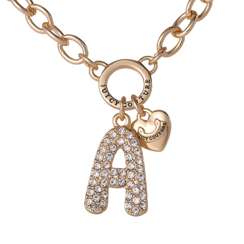 Introducing the Bubble Initial Necklace, Letter A: This gold chain necklace features a bold bubble letter “A” charm encrusted with sparkling crystals for that iconic Y2K aesthetic. A petite gold heart charm, engraved with Juicy Couture, adds a whimsical accent. Both charms hang gracefully from a round link on the necklace, creating a personalized and playful piece of jewelry.