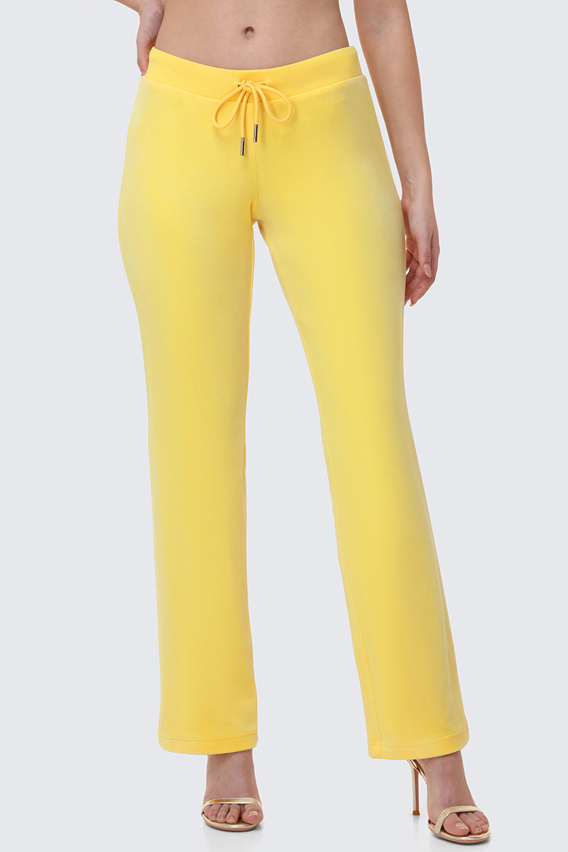 Bright yellow Y2K OG Big Bling Velour Track Pants with a drawstring waistband and Juicy embellishment.