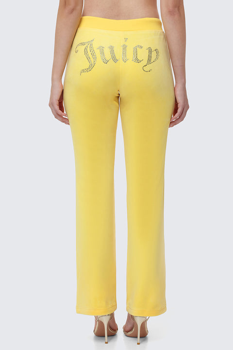 Back view of yellow OG Big Bling Velour Track Pants with the word Juicy spelled out in rhinestones on the seat.