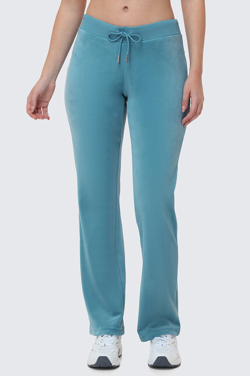 OG Big Bling Velour Track Pants in teal, featuring a Juicy embellishment and a drawstring waist.