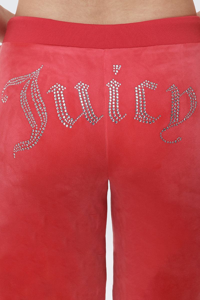 Red OG Big Bling Velour Track Pants with the word Juicy spelled out in rhinestones across the back.