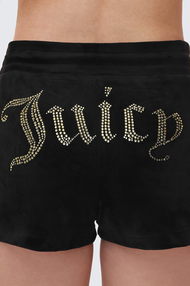 Close-up of the back of the Big Bling Velour Shorts in black, showcasing a gold rhinestone Juicy logo across the velour fabric.