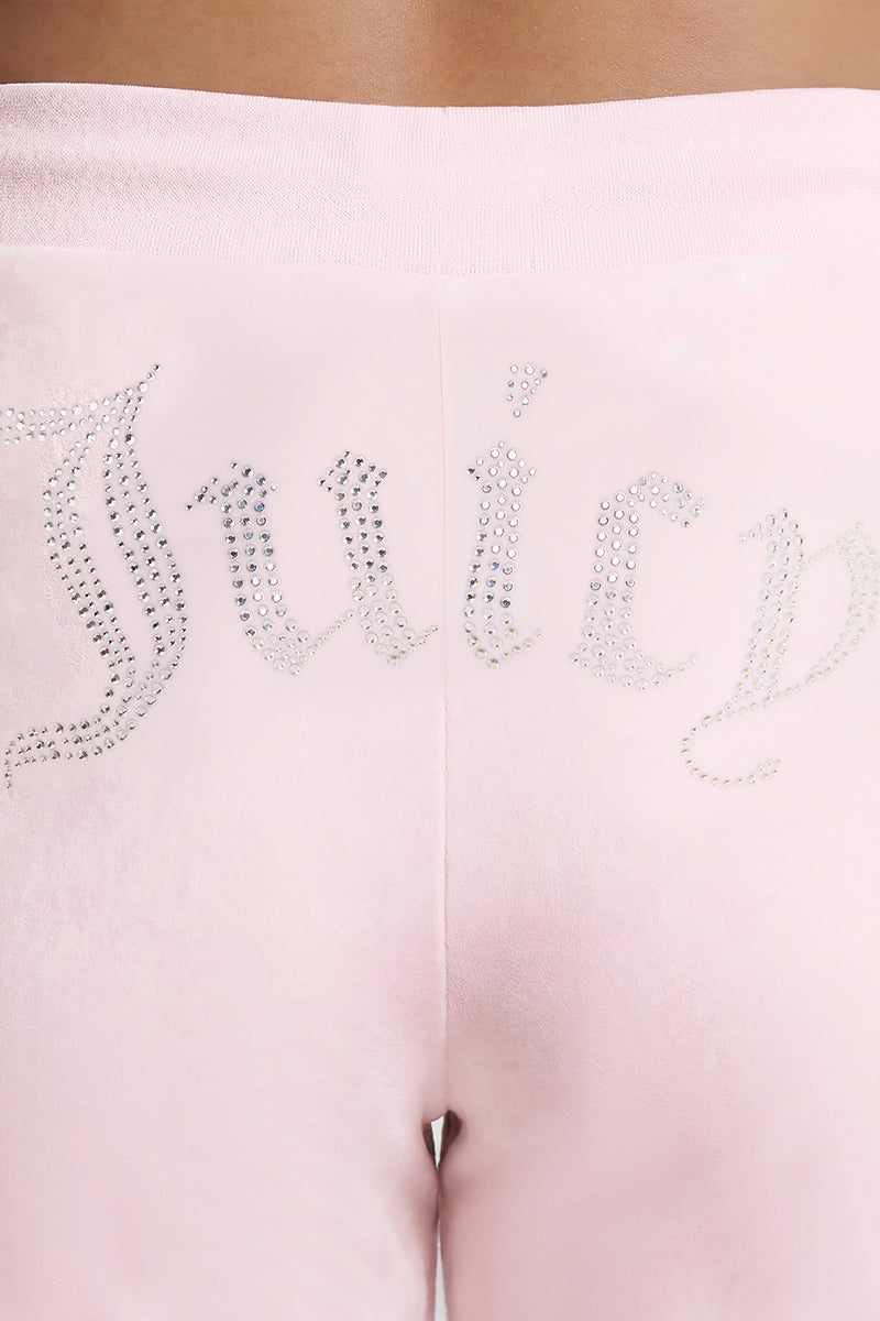 Close-up of the back of the Plus-Size OG Big Bling Velour Track Pants in light pink, featuring “Juicy” spelled out in silver rhinestones across the waistband and serving up that iconic Y2K vibe.
