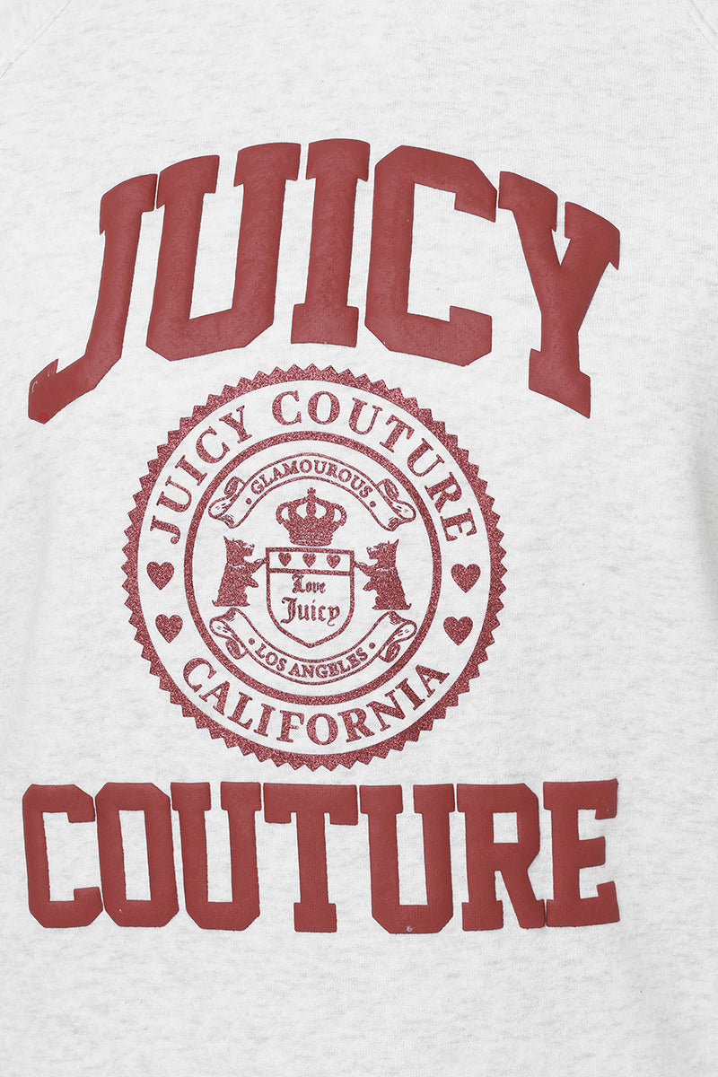 Sure! Here’s a rewritten version using the given product data: The Scottie Fleece Oversized Hoodie features red JUICY COUTURE text and a circular Juicy crest logo with GLAMOROUS, hearts, crest, and CALIFORNIA details printed on soft white fleece in an oversized fit.