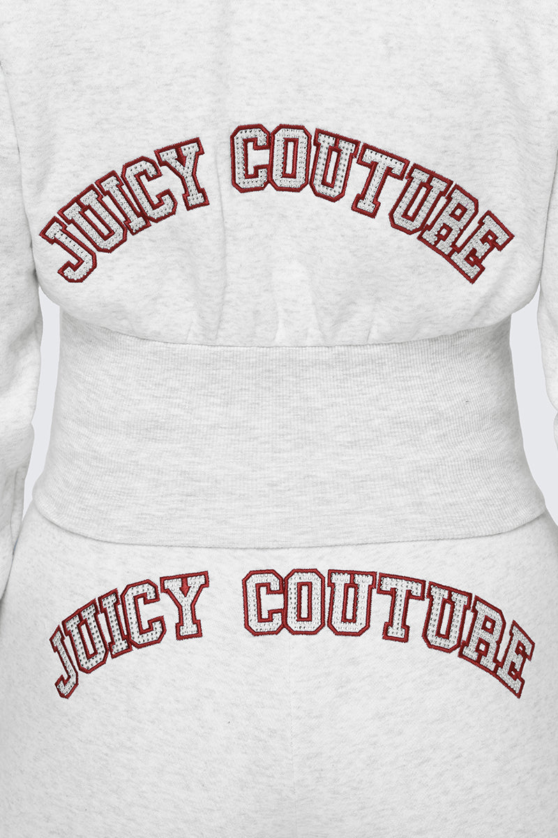 Close-up of the Small Bling Fleece Quarter Zip Hoodie in grey, featuring Juicy Couture in red, sparkly letters on the back and a fitted silhouette that flatters your shape.