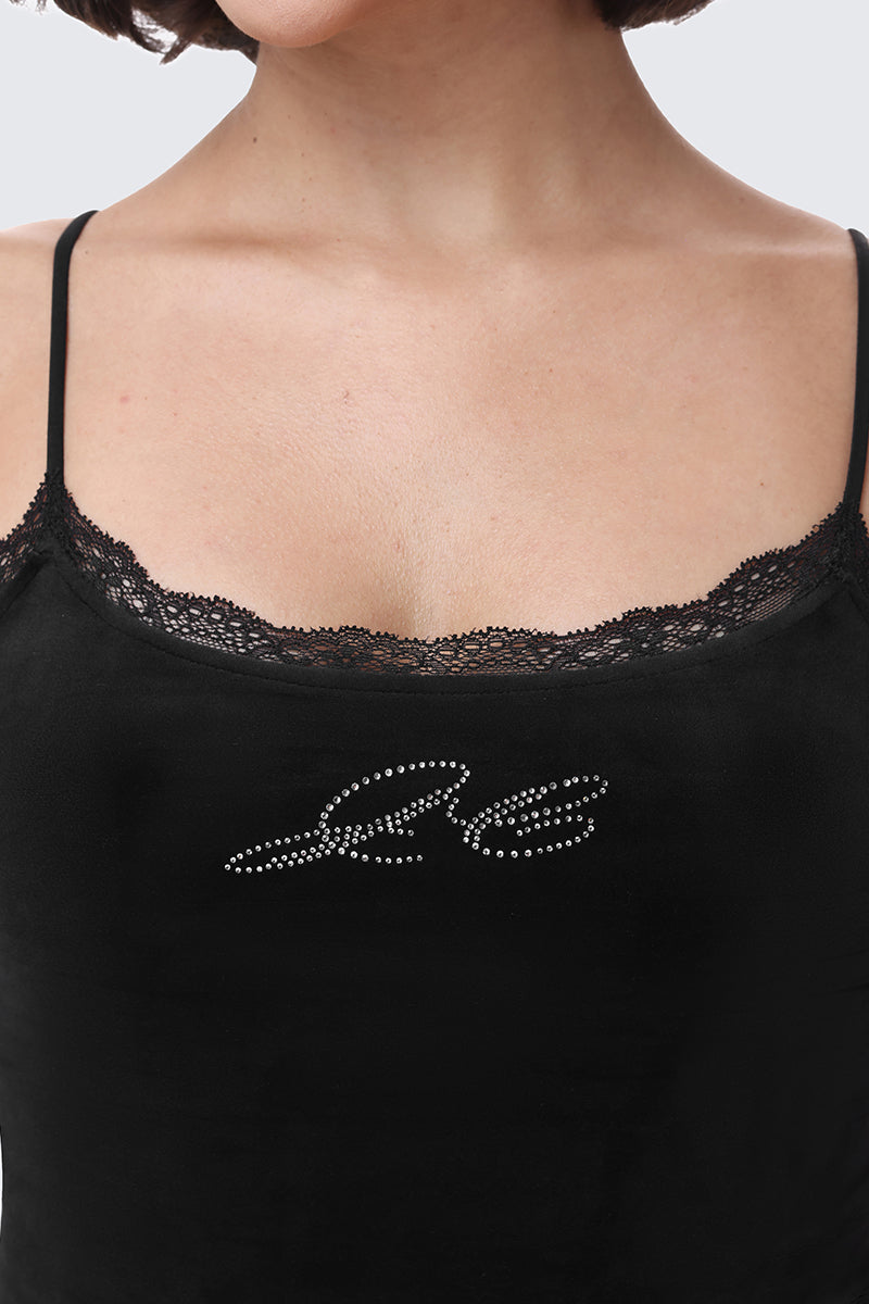 Small Bling Cropped Cami in black, featuring a Y2K-inspired cropped silhouette, thin straps, a lace-trimmed neckline, and a script-style logo in small clear crystals.