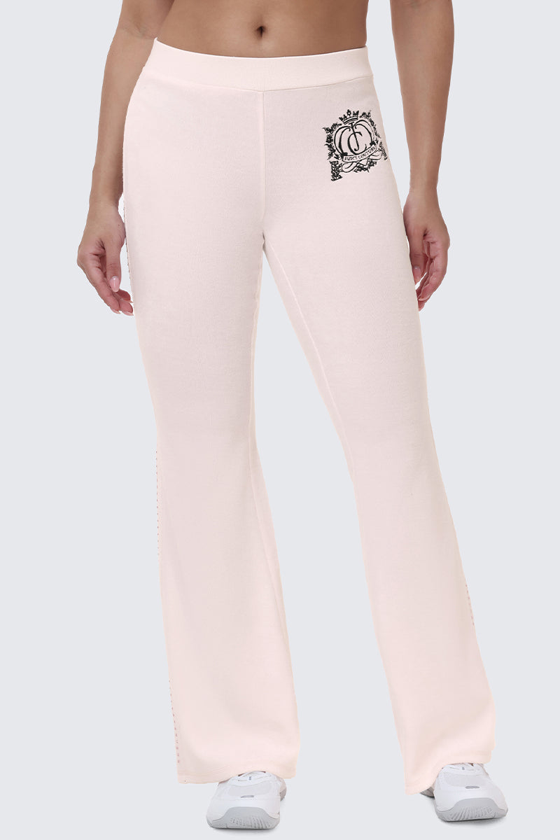 Scottie Crown Cotton Velour Track Pants in pale pink cotton velour with a sporty silhouette and a black crest logo on the left hip.