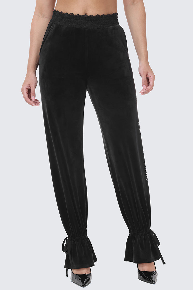 Black Small Bling Velour Track Pants featuring a lace waistband and gathered, tie-detail cuffs at the ankles.