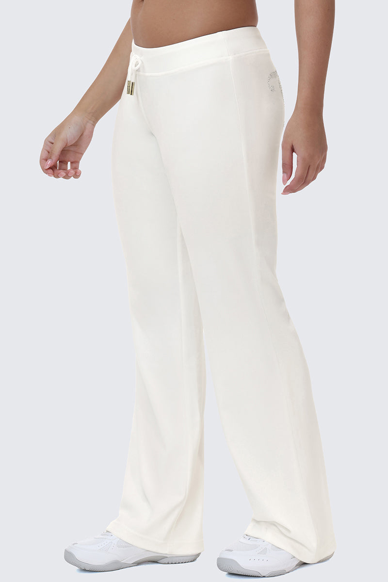 Cream-colored OG Big Bling Velour Track Pants featuring a drawstring waistband and a small Juicy bling rhinestone detail on the back pocket.