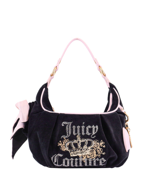 The Royal Bloom Hobo Bag by Juicy Couture is a chic black bag with a light pink handle, gold and silver embroidered crown and logo, plus a decorative bow—stylish and perfect for everyday use.