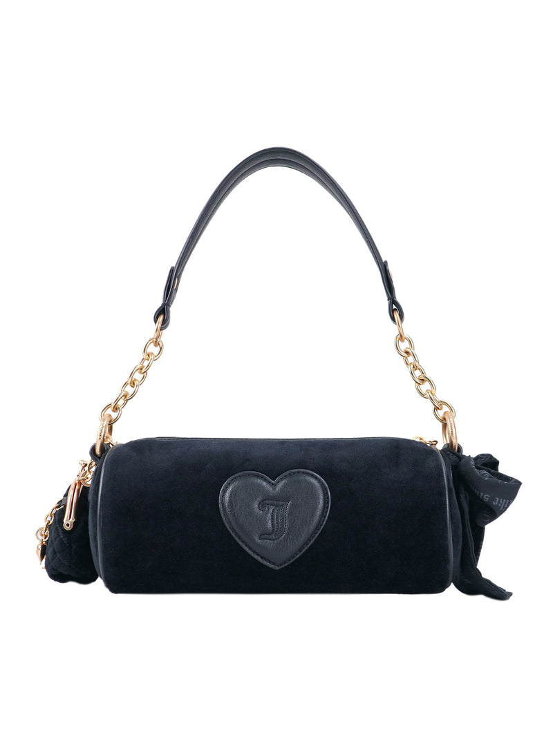Black cylindrical Crowns & Kisses Shoulder Bag with gold chain straps and a centered heart-shaped patch featuring an embossed letter J, blending feminine nostalgia with signature Juicy details.