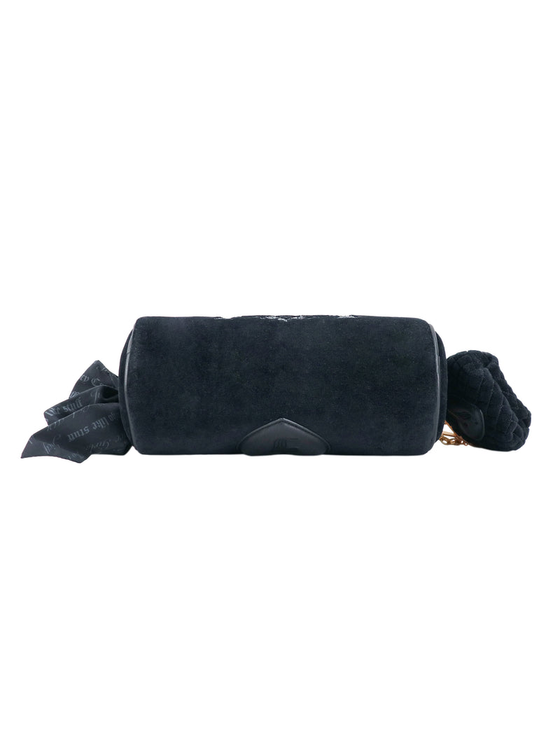 Black cylindrical Crowns & Kisses Shoulder Bag with a fabric ribbon tie and feminine nostalgia details on the side.