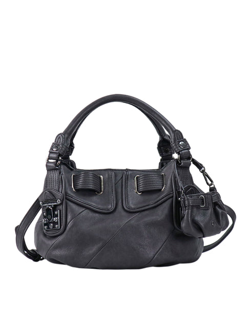Twist & Shout Crossbody Bag, a structured black handbag featuring a detachable circular pouch and silver hardware for everyday styling.