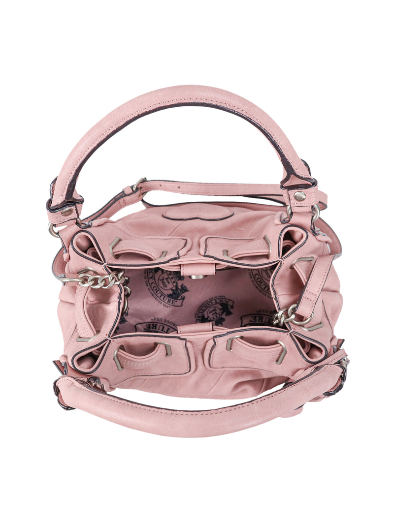 Light pink Twist & Shout Crossbody Bag with a drawstring closure, two handles, and a patterned interior lining perfect for everyday styling.