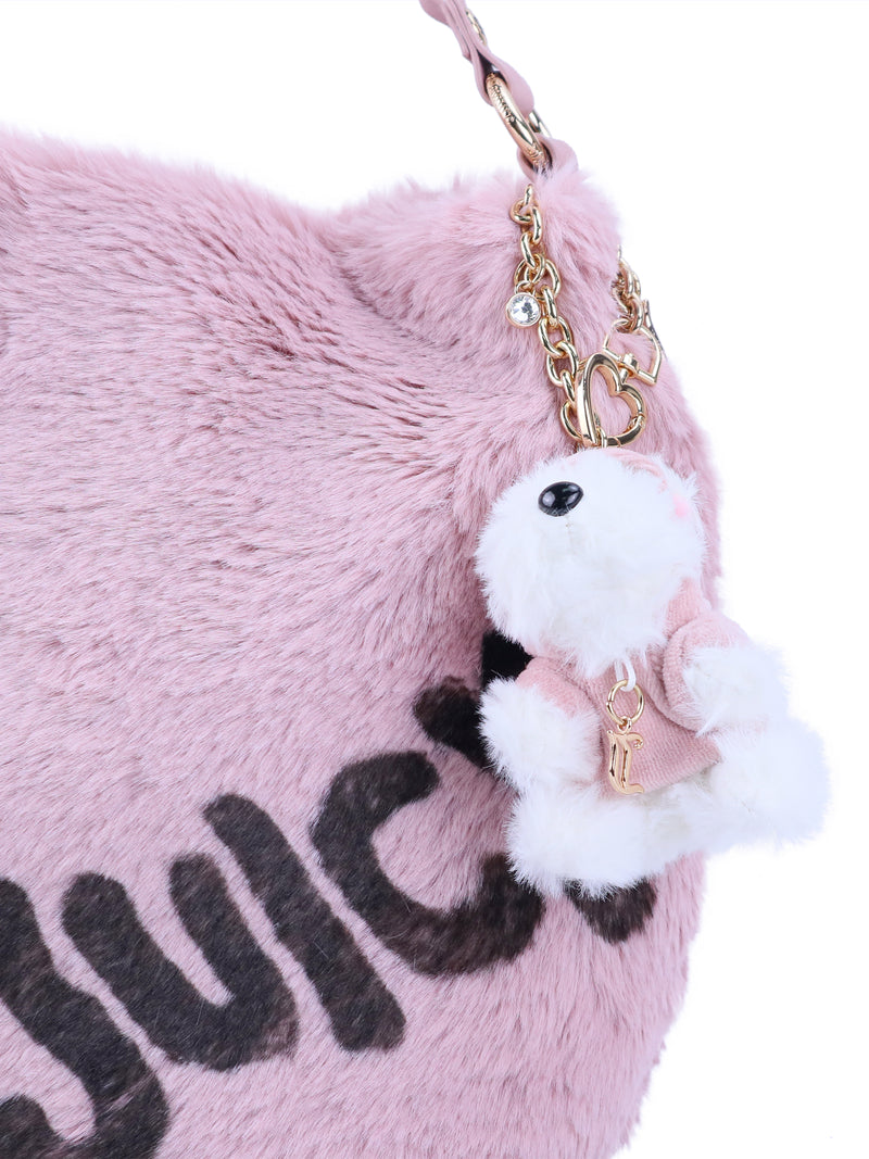 Viva La Juicy Hobo Bag in pink faux-fur with an everyday silhouette, featuring a large black Juicy logo and a white plush dog charm on a gold-tone chain.