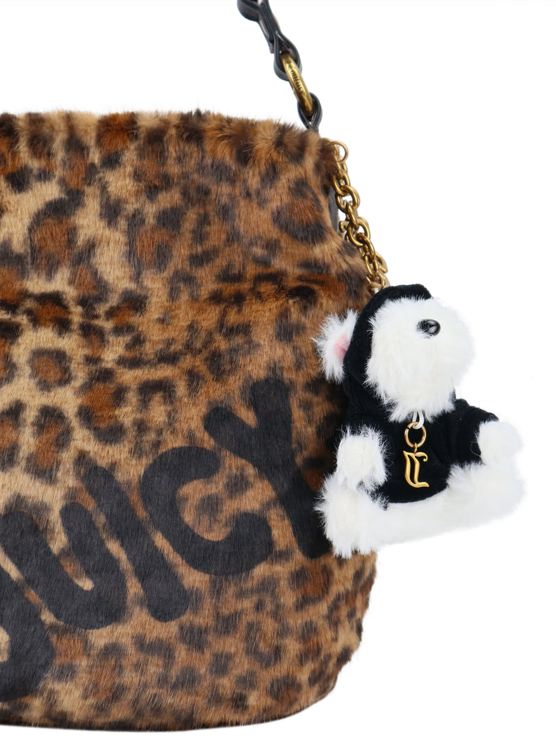 Leopard-print Viva La Juicy Hobo Bag with a black logo, a gold chain strap, and a plush dog charm.