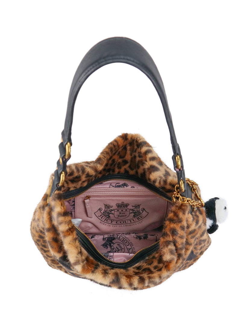 Leopard print Viva La Juicy Hobo Bag with a black shoulder strap, gold chain accents, and a pink branded lining in an everyday silhouette.