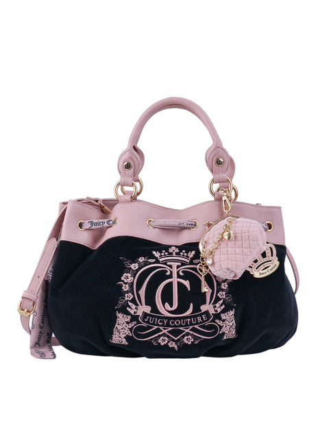 Crowns & Kisses Satchel Bag in black velour with pink trim, featuring a statement-making silhouette, a large embroidered crest on the front, gold-tone hardware, and a heart-shaped bag charm.