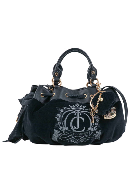Black Y2K Crowns & Kisses Satchel Bag with a drawstring top, a large embroidered logo on the front, and gold-toned glamour charms including a crown and a key.