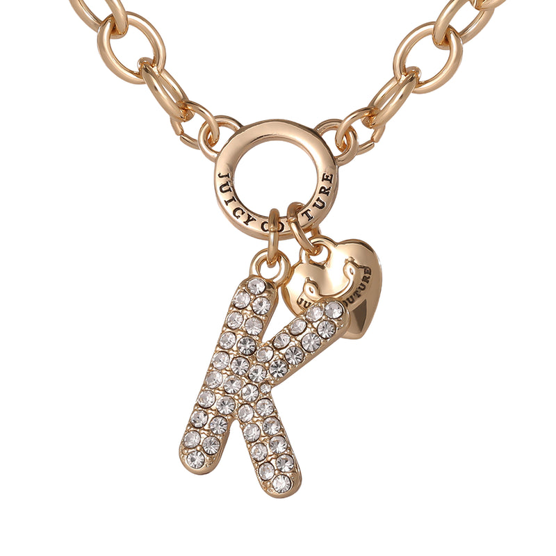 Add a pop of playful nostalgia to your style with the Bubble Initial Necklace, Letter K. This gold chain necklace from Juicy Couture features a round signature pendant, a delicate gold heart charm, and a bold bubble letter K charm embellished with rhinestones—perfect for channeling Y2K aesthetic jewelry vibes in your look.