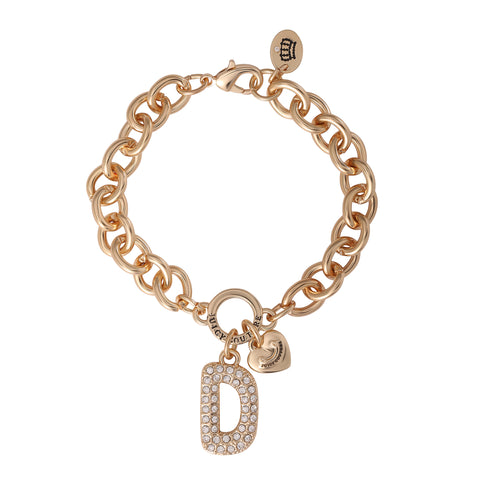 Pavé Initial Charm Bracelet, Letter D: This gold chunky bracelet features a large pavé crystal-encrusted letter D charm alongside a small gold heart charm. Designed with a secure lobster clasp and adorned with a round Dior-engraved tag near the closure, this stunning charm jewelry piece brings an elegant yet playful aesthetic reminiscent of iconic Juicy Couture bracelet styles.