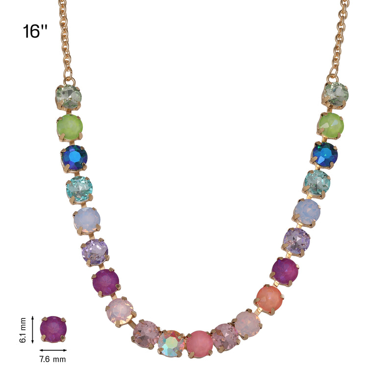 Introducing the Tennis Necklace with Multicolor Crystals—a striking gold-plated statement piece that showcases round, multicolored crystals in prong settings. Each 8.1 mm by 7.6 mm crystal is arranged in a captivating gradient pattern along a 16-inch chain, creating a bold yet versatile necklace that brings vibrant color to any outfit.