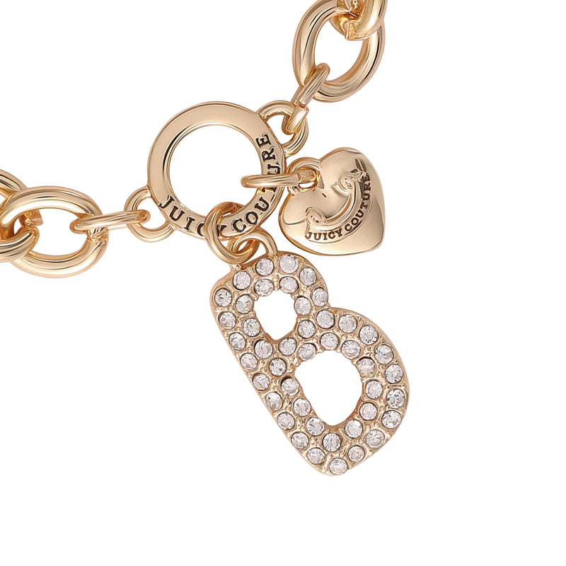 The Pavé Initial Charm Bracelet, Letter B, showcases a gold chunky chain design adorned with a rhinestone-encrusted “B” charm and a small gold heart engraved with Juicy Couture, making it the perfect accessory for any Juicy Couture bracelet collection.