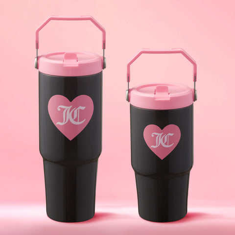 Two Flip Flow Hydration Stainless Steel Tumbler Cups are shown against a pink background. Each insulated tumbler has a pink lid and handle, plus a pink heart design—perfect for gifting as a mommy and me set.