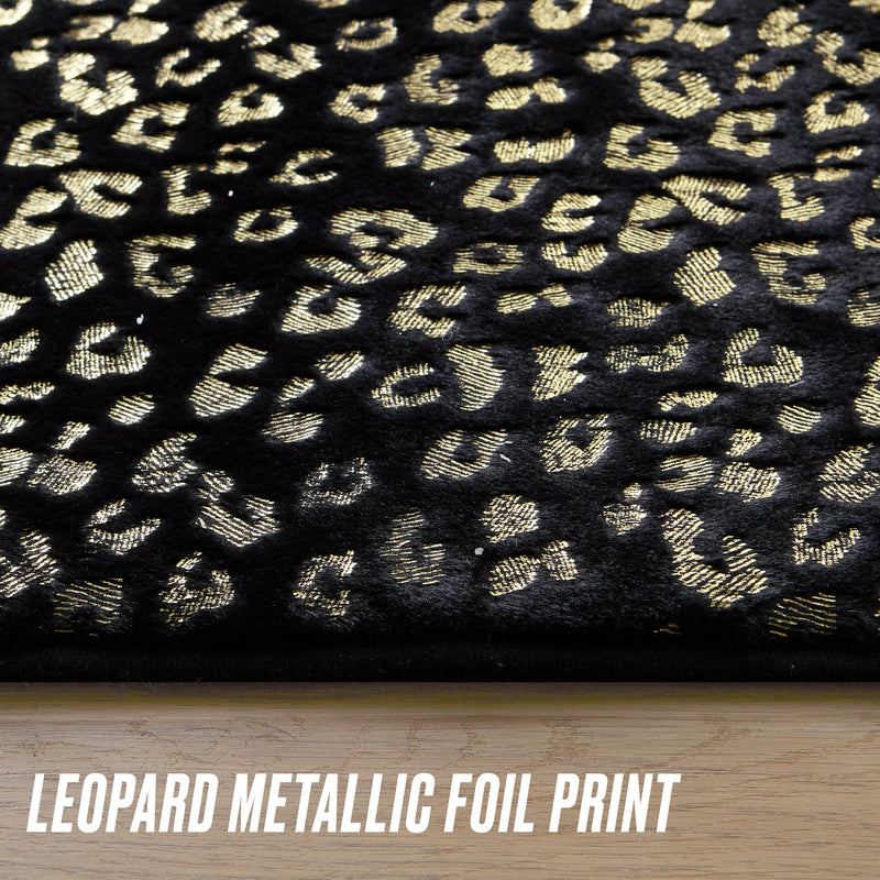 A close-up of the Metallic Leopard Plush Rug, 2' x 6', shows shiny gold leopard spots on a plush black background. “Leopard Metallic Foil Print” appears at the bottom in bold white letters.