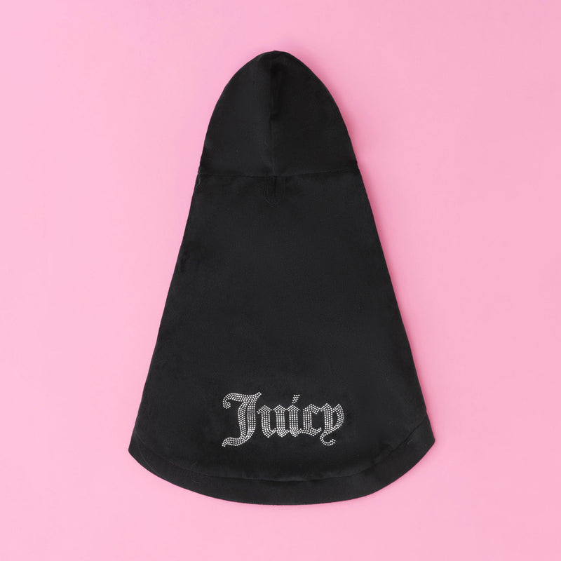 A black Bling Velour Pet Hoodie with “Juicy” spelled out in rhinestones across the back, set against a pink background, embodies the signature sparkle and designer charm of Juicy Couture pet apparel—ideal for those who love a touch of bling for their pets.