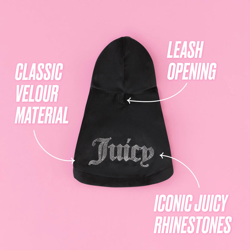 Wrap your pup in luxury with the Bling Velour Pet Hoodie—a black velour pet hoodie featuring a convenient leash opening and dazzling “Juicy” rhinestone detailing on the back. This designer piece showcases sumptuous velour fabric, practical design elements, and iconic sparkling accents, all elegantly presented against a playful pink backdrop.