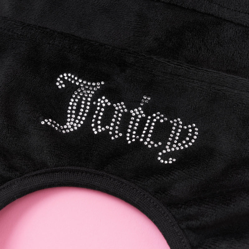 Introducing the Bling Velour Pet Tracksuit, crafted from black velour fabric and adorned with the word “Fancy” in sparkling rhinestones. A unique circular cutout reveals a pink background beneath—an eye-catching detail that adds standout style to your pet’s outfit or chic tracksuit look.