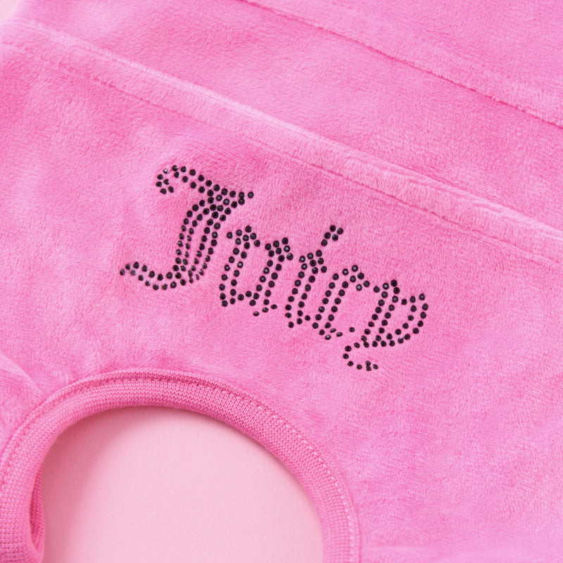 A close-up of the Bling Velour Pet Tracksuit in pink terrycloth, featuring the word “Fancy” spelled out in black rhinestones with a cursive font—perfect for adding a touch of sparkling style to your pet’s wardrobe.