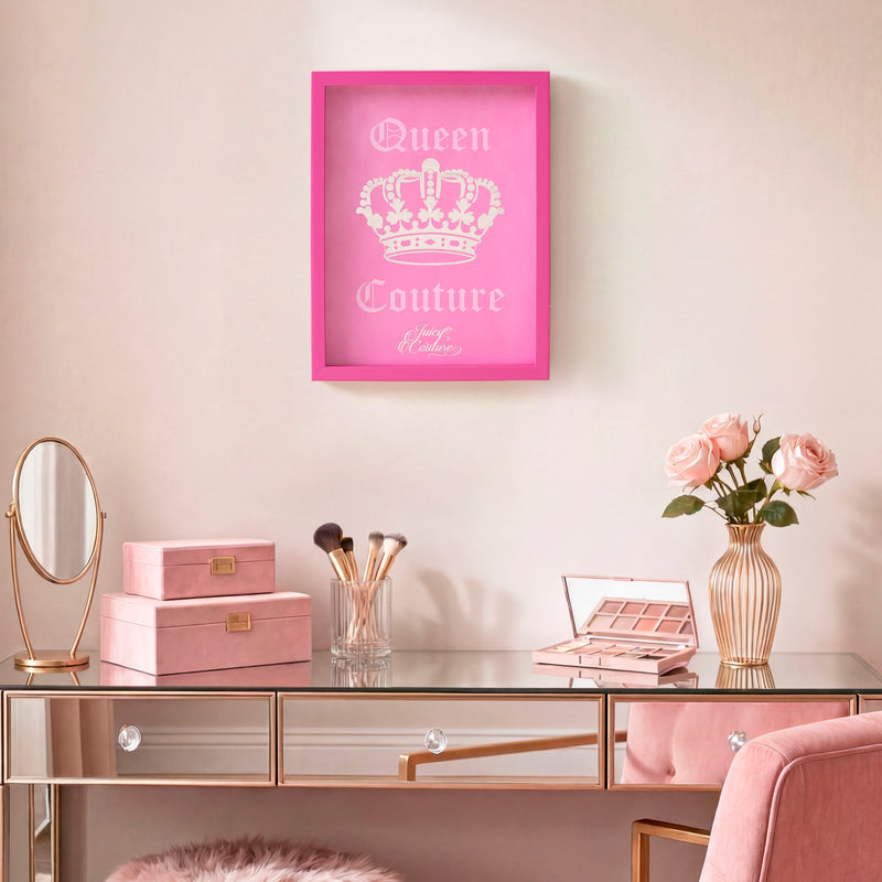 A chic vanity with a mirror, pink makeup boxes, brushes, and a vase of pink roses is complemented by the Shadow Box Wall Art (12″ x 16″) displayed on the wall above. Featuring fashion-inspired artwork with gold and blush pink tones, this elegant piece enhances the stylish décor, adding a refined touch to the space.