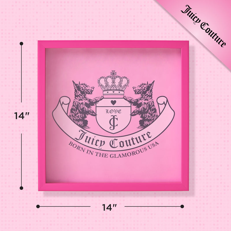 The Shadow Box Wall Art, 14″ x 14″, features a pink frame and showcases two dogs, a crown, and a banner that reads “LOVE Juicy Couture Born in the Glamorous USA.” Fashion-inspired and playful, this piece adds a stylish accent to any space.