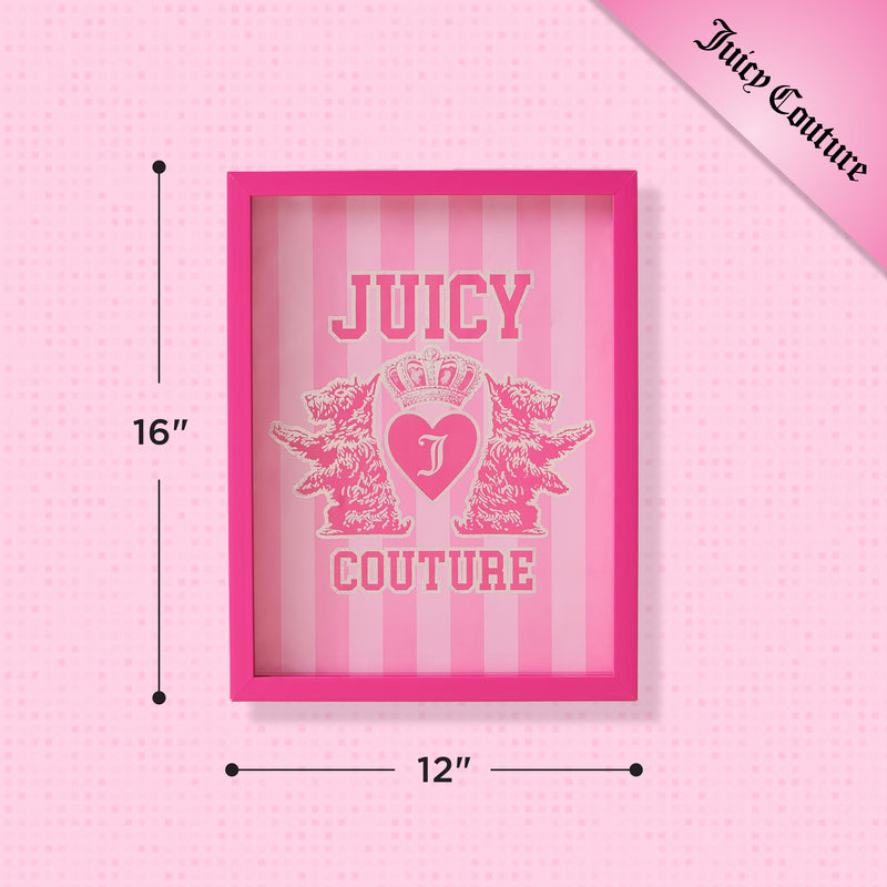 The Shadow Box Wall Art, measuring 12″ x 16″, showcases a pink heart topped with a crown and flanked by two dogs against a striped pink background. This fashion-inspired piece features the iconic Juicy Couture logo in the top right corner, making it a standout addition to any space.