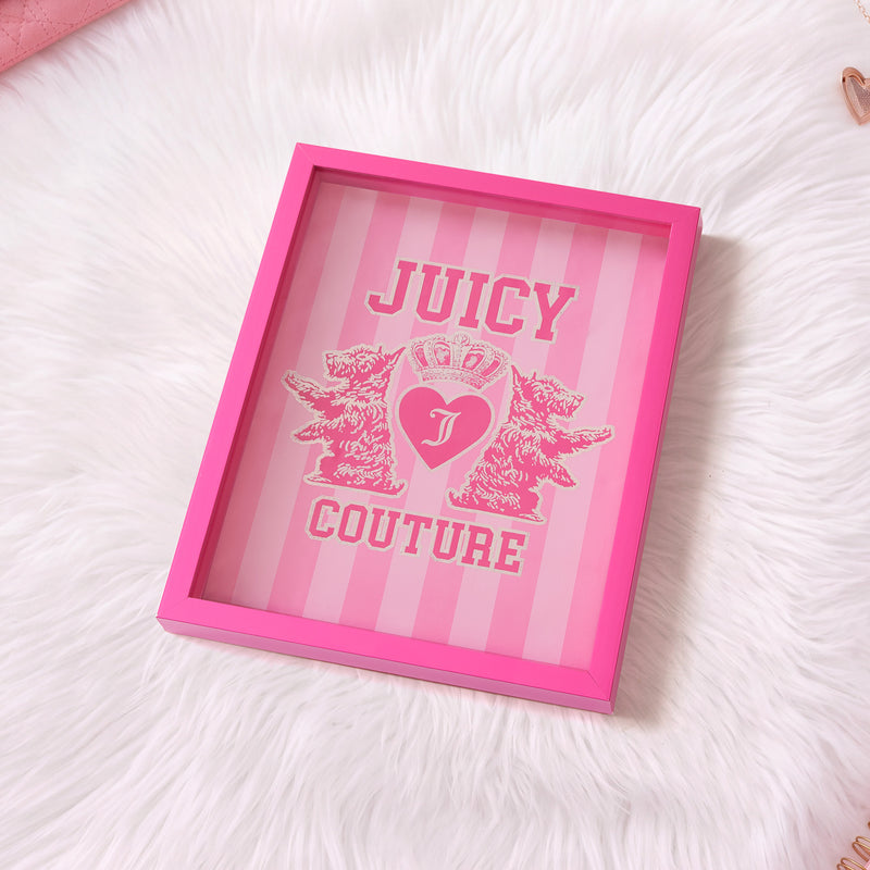 Add a fashion-forward touch to your space with the Shadow Box Wall Art, 12″ x 16″—featuring a pink frame, Juicy Couture text, heart, crown, and two illustrated dogs on a pink striped background. Displayed on a white fluffy surface, this stylish piece is perfect Juicy Couture wall art for any chic room.