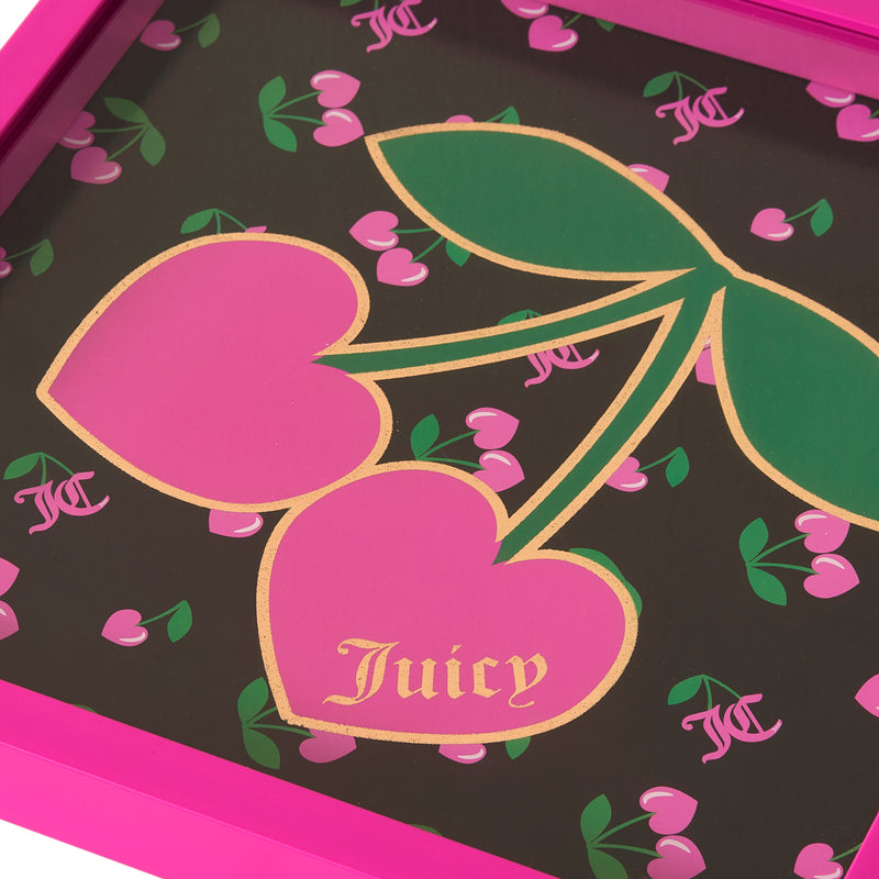 The Shadow Box Wall Art, 14″ x 14″, features a bold design with two large pink cherries and green leaves set against a dark backdrop, dotted with smaller pink cherries. One cherry is adorned with the word “Juicy” in gold lettering, evoking the playful style of Juicy Couture. Finished with a vibrant pink border, this fashionable piece adds a pop of artistic flair to any room.