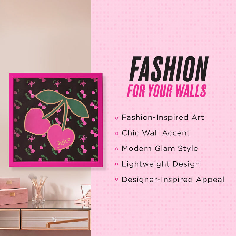 Framed Shadow Box Wall Art, 14″ x 14″, featuring pink cherry Juicy Couture design displayed on a wall, with text beside it highlighting its fashion-inspired artwork, chic wall accent, modern glam style, lightweight design, and designer-inspired appeal. Stylish decor items are arranged on a shelf below.
