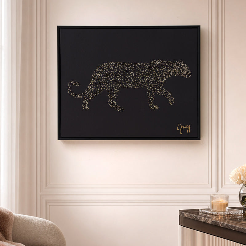 A Shadow Box Wall Art, 16″ x 20″, hangs on a cream-colored wall above a marble table with a vase of pale flowers in a modern, elegant room.
