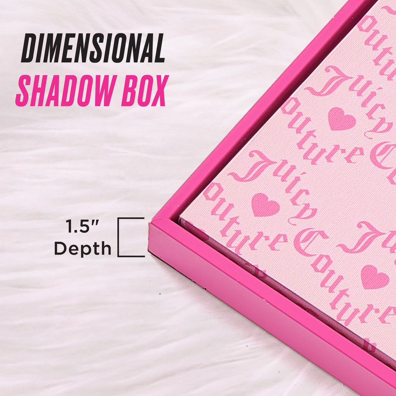 A stylish Shadow Box Wall Art, measuring 16″ x 20″ with a depth of 1.5 inches, showcases a pink Juicy Couture design set against a white furry background for chic, fashion-inspired décor. The text “DIMENSIONAL SHADOW BOX” and “1.5 Depth” adds to the modern appeal, making this piece the perfect addition to your collection of Juicy Couture wall art or shadow box art.