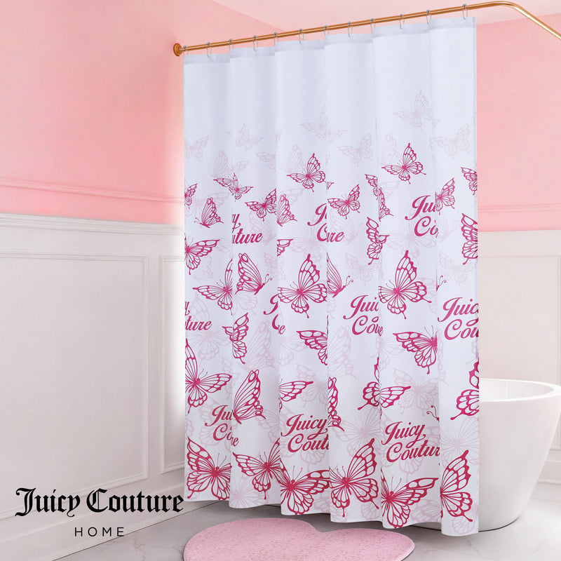 A pink and white bathroom features a white bathtub and the Shower Curtain and Hooks Set with pink butterfly designs. The fabric curtain and matching pink rug complement the stylish pink and white walls.