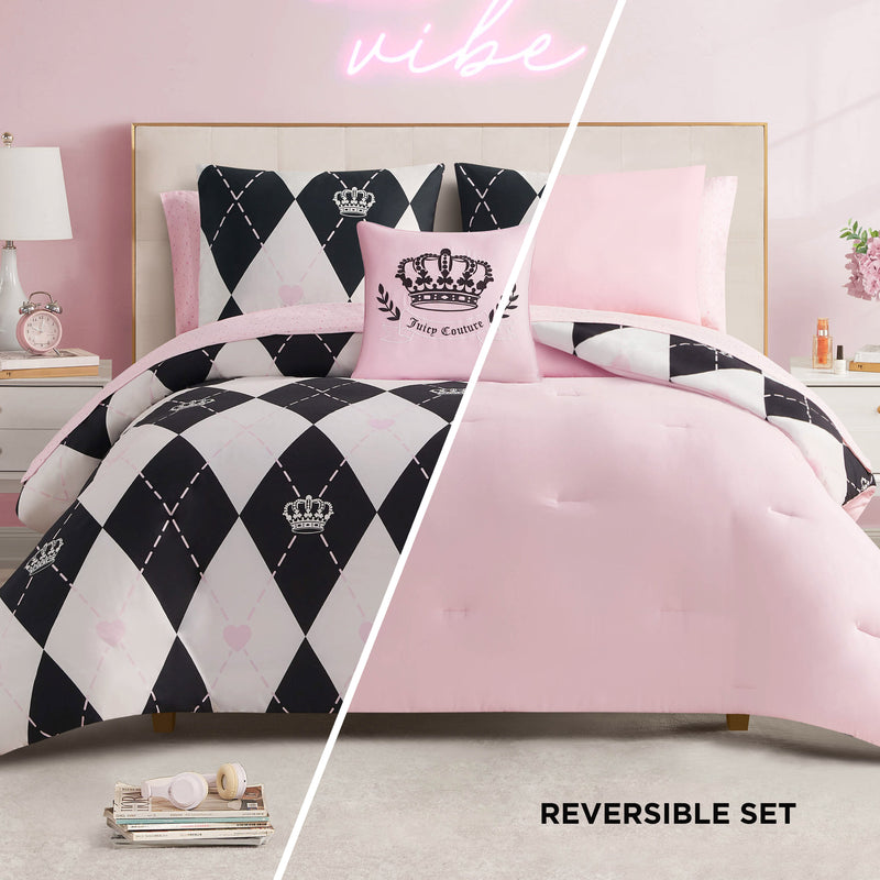 The Royal Argyle Reversible Bed in a Bag Bedding Set features a black and white argyle with crowns on one side, solid pink on the other. Includes a pink pillow with crown logo. Shown with white nightstand, lamp, and pink décor. Text: “REVERSIBLE SET.