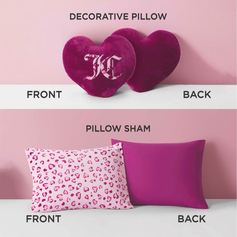 The Plush Reversible Leopard Hearts Comforter Set includes heart-shaped pink KC initial pillows and rectangular pink leopard print and magenta pillows, shown front and back to highlight its reversible bedding set design.