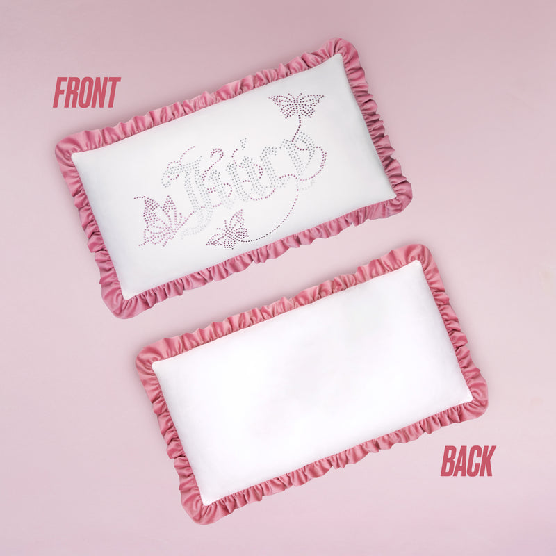 The Ruffle Decorative Pillow is rectangular and white with pink ruffles. The front shows decorative text, butterfly designs, and rhinestones; the back is plain white with matching ruffles. Both sides are labeled FRONT and BACK on a pink background.