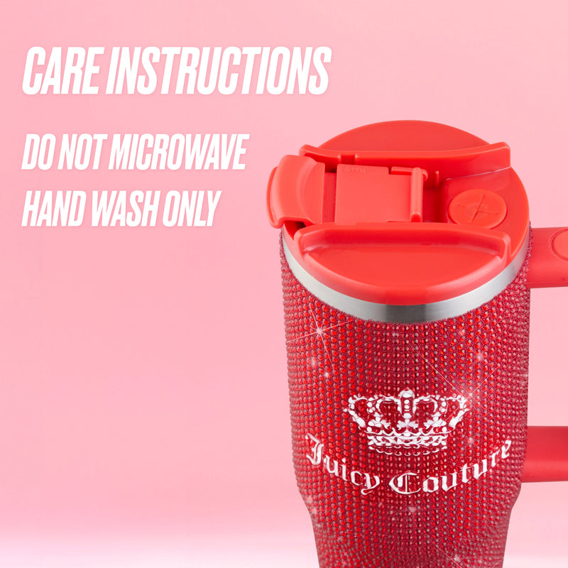 A Diamond Bling Stainless Steel Tumbler with Handle and Straw, 30 oz, in vibrant red and adorned with sparkling rhinestone details, is displayed against a pink background. White text reads: “Care Instructions: Do not microwave. Hand wash only.” This dazzling tumbler brings a touch of glamour to your drinkware collection.