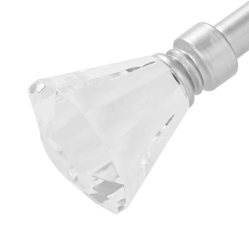 Here is a rewritten sentence using the provided product data: A close-up of the Malibu 2-Piece Adjustable Curtain Rod Set showcases its faceted clear crystal finial and brushed silver metal finish, emphasizing its adjustable telescoping design.