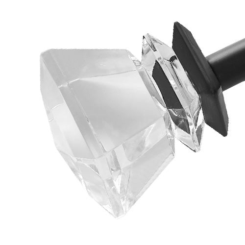 A clear, faceted glass or acrylic diamond-shaped finial is attached to the end of the Bel Air 2-Piece Adjustable Curtain Rod Set, shown against a white background.