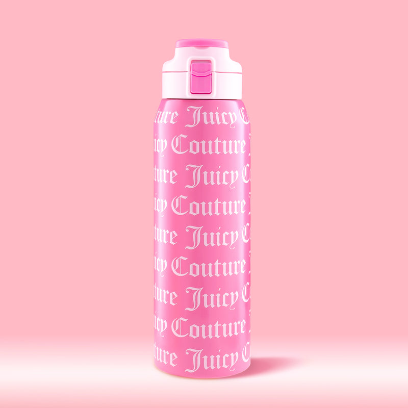 The Glam Getaway Hydration Stainless Steel Tumbler is a 32oz pink Juicy Couture tumbler with a white lid, flip-top spout, and “Juicy Couture” in bold white gothic letters—perfect for stylish, everyday hydration.